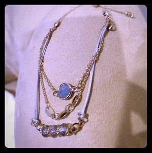 Gorgeous multi-layered pull-through bracelet.